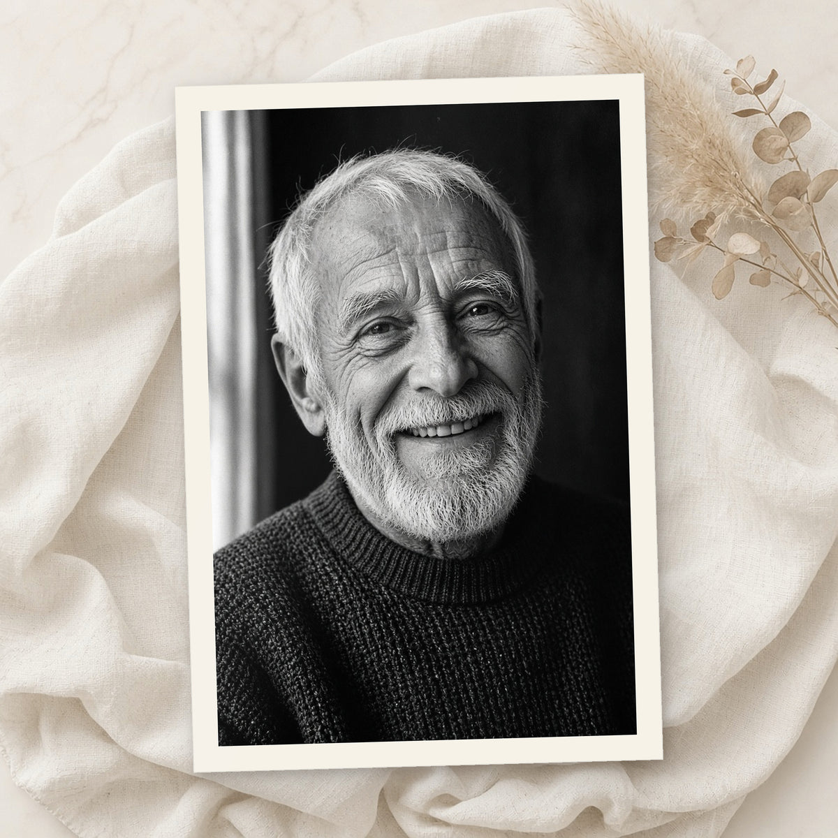 Example print: black and white portrait of a smiling older man, printed on Hahnemühle Photo Rag Baryta 315g