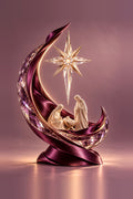 Crystal crescent moon wrapped in burgundy satin ribbon holding a porcelain nativity scene under the Star of Bethlehem, on a mauve background