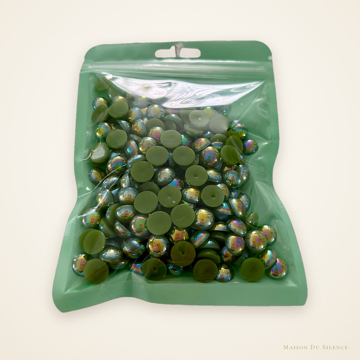 Bag of peridot green AB flatback half pearls, 10 mm, 60g