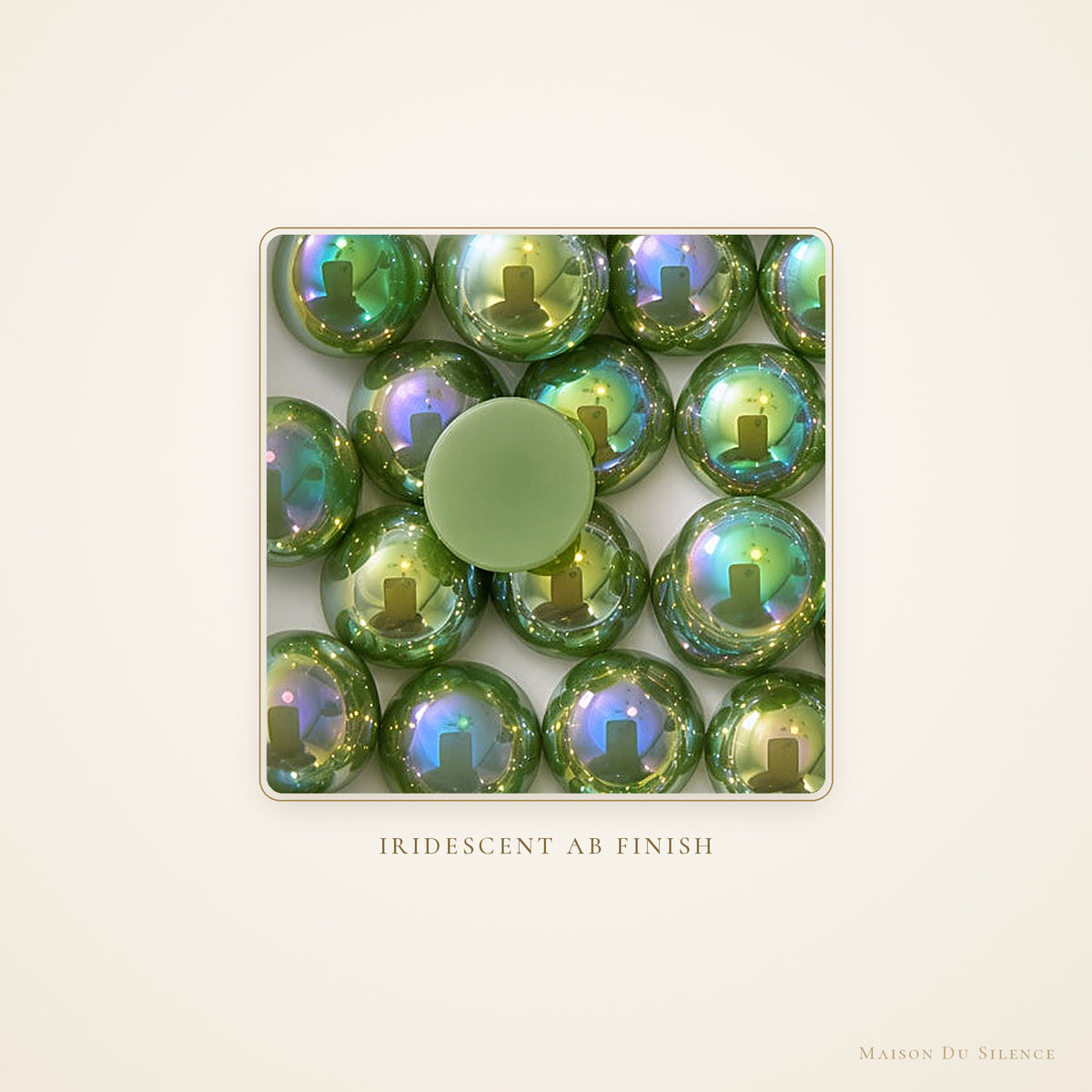 Close-up of green 10 mm flatback pearls showing the iridescent AB shimmer