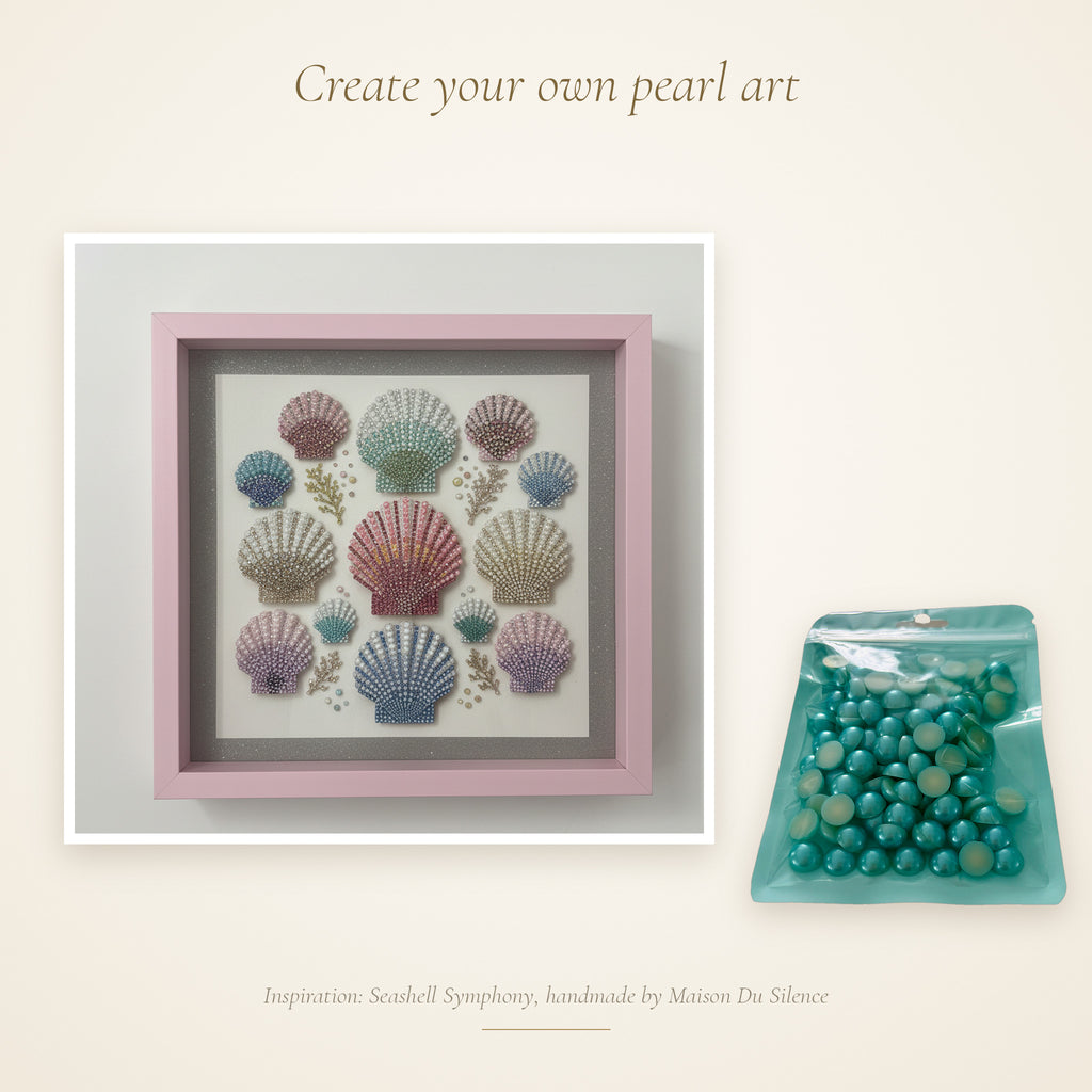 Aquamarine half pearls beside a handmade Maison Du Silence seashell artwork for inspiration