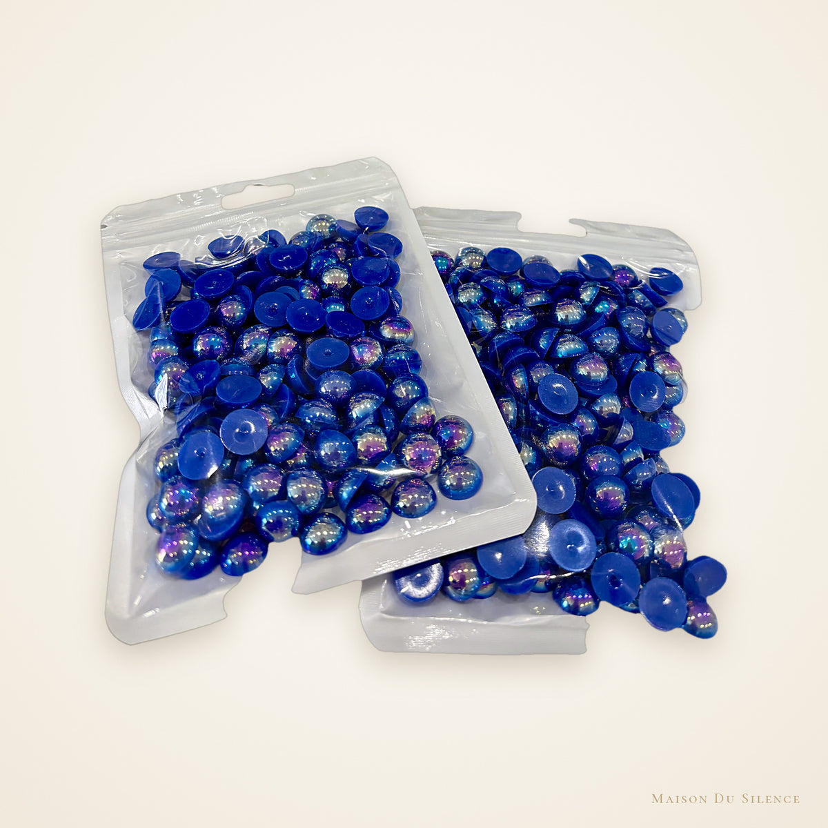 Bags of sapphire blue half pearls, 12 mm, 60g