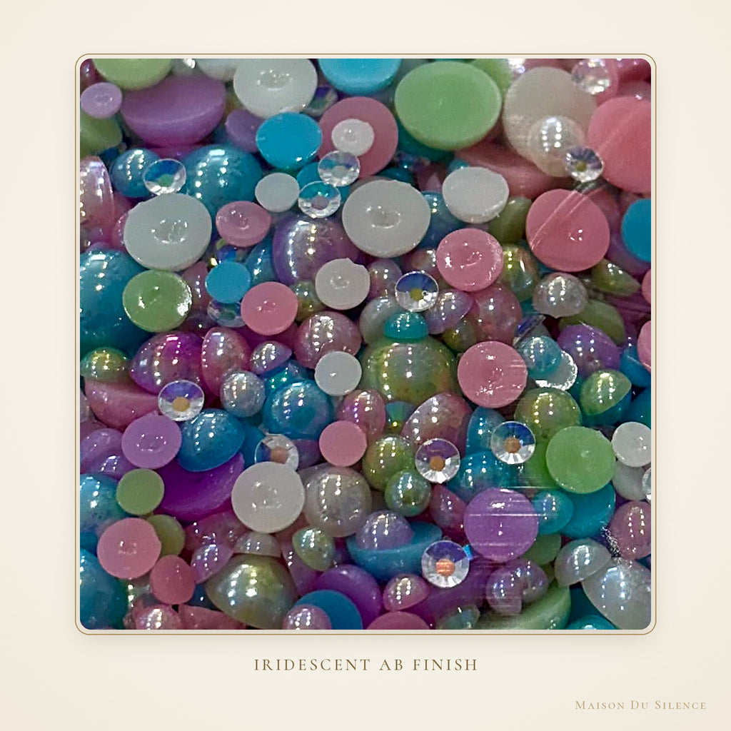 Close-up of pastel half pearls showing the iridescent AB finish