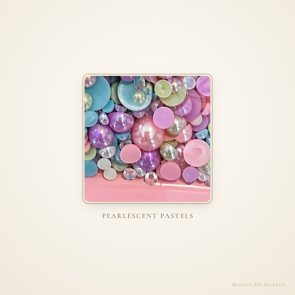 Close-up of pastel pearlescent beads in assorted sizes
