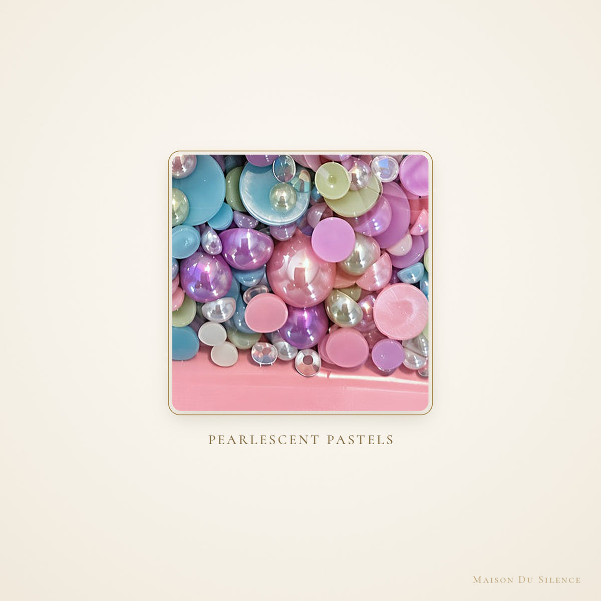Close-up of pastel pearlescent beads in assorted sizes
