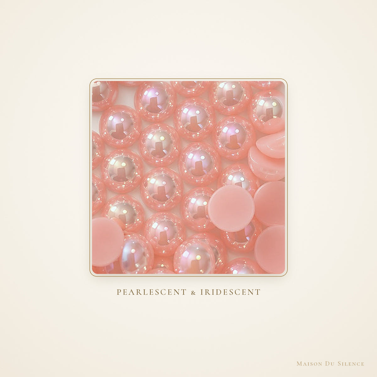 Close-up of pink pearlescent and iridescent 10 mm beads in a white dish