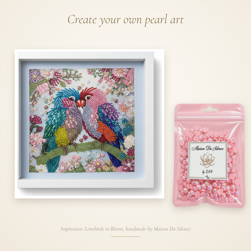 Pink bead mix beside a handmade Maison Du Silence crystal and pearl artwork for inspiration
