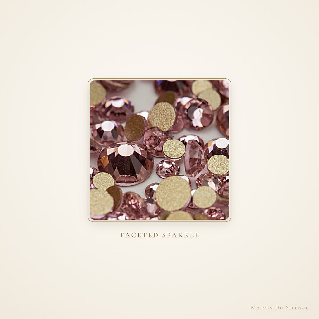 Macro detail of the faceted sparkle on pink SS10 glass rhinestones